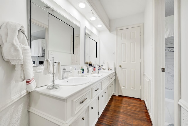 6710 Blue Hills Rd, Houston, TX 77069 - full bath featuring double vanity, wood finished floors, recessed lighting, and a tub to relax in