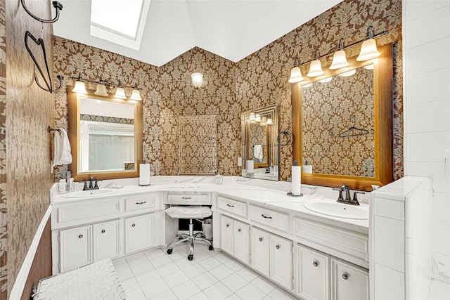 6710 Blue Hills Rd, Houston, TX 77069 - full bathroom with wallpapered walls, double vanity, tile patterned floors, a skylight, and vaulted ceiling