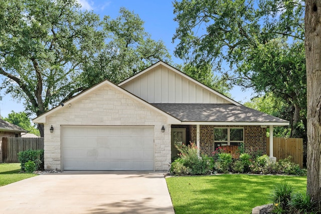 6112 Guyler St, Wallis, TX 77485 - ranch-style home featuring driveway, an attached garage, roof with shingles, board and batten siding, and stone siding