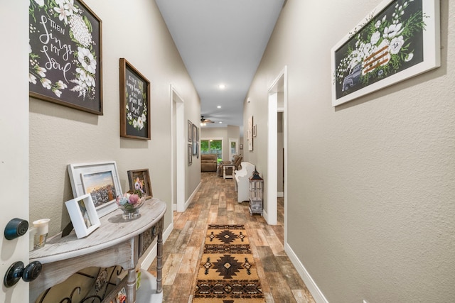 6112 Guyler St, Wallis, TX 77485 - hallway featuring wood-type flooring and recessed lighting