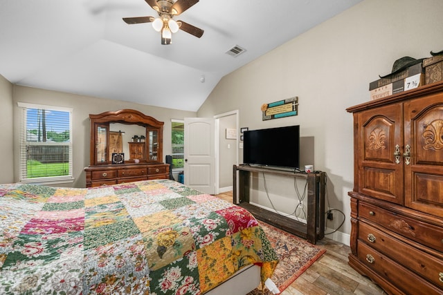 6112 Guyler St, Wallis, TX 77485 - bedroom featuring light wood-type flooring, lofted ceiling, and ceiling fan