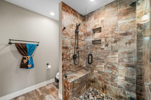 6112 Guyler St, Wallis, TX 77485 - bathroom featuring a shower stall, wood finished floors, and recessed lighting
