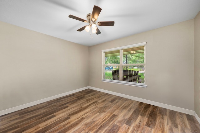 6112 Guyler St, Wallis, TX 77485 - spare room with dark wood-type flooring and ceiling fan