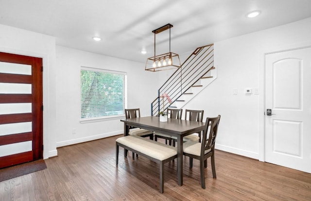 3021 Prospect St, Houston, TX 77004 - dining space featuring stairway, wood finished floors, and recessed lighting