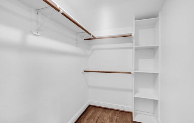 3021 Prospect St, Houston, TX 77004 - spacious closet featuring wood finished floors