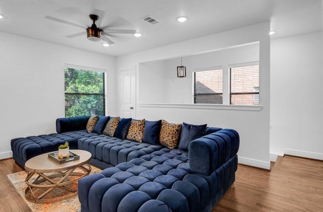 3021 Prospect St, Houston, TX 77004 - living room with wood finished floors, ceiling fan, and recessed lighting