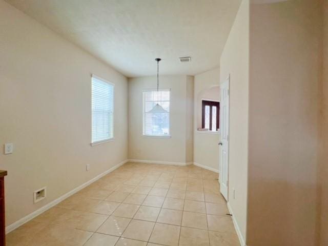 14706 Branchwest Dr, Houston, TX 77082 - unfurnished room with healthy amount of natural light and light tile patterned floors