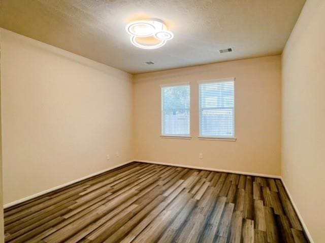 14706 Branchwest Dr, Houston, TX 77082 - unfurnished room with wood finished floors and baseboards
