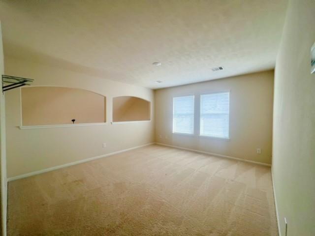 14706 Branchwest Dr, Houston, TX 77082 - spare room with light colored carpet and baseboards