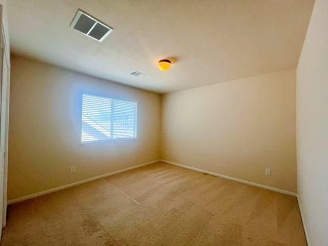 14706 Branchwest Dr, Houston, TX 77082 - empty room with light colored carpet and baseboards