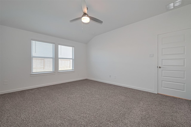 30119 Ousel Falls Ln, Katy, TX 77494 - empty room with a ceiling fan, dark carpet, and lofted ceiling