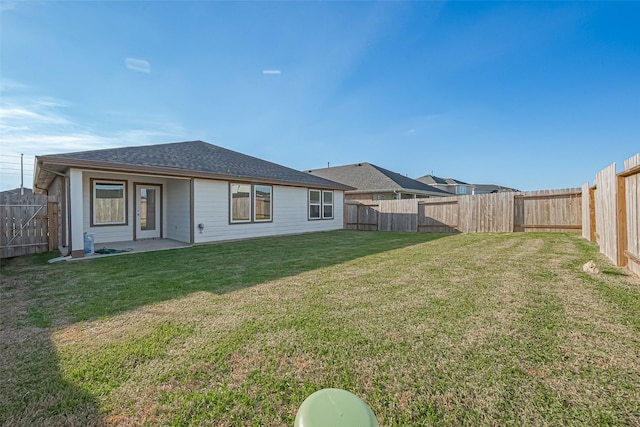 30119 Ousel Falls Ln, Katy, TX 77494 - rear view of house featuring a fenced backyard and a shingled roof