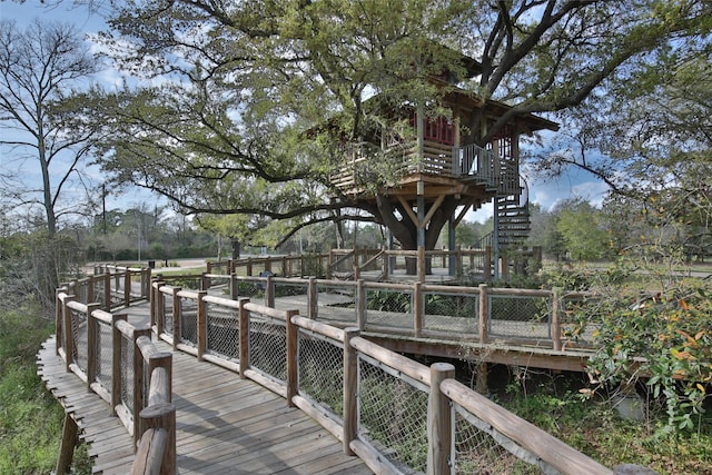 15122 Parkland Canyon Dr, Cypress, TX 77433 - dock area featuring a wooden deck and stairs