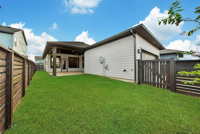 15122 Parkland Canyon Dr, Cypress, TX 77433 - back of house with a fenced backyard, a patio area, and an attached garage