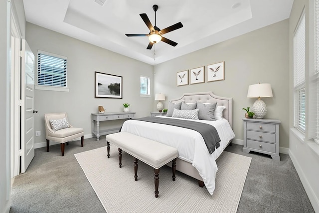 15122 Parkland Canyon Dr, Cypress, TX 77433 - carpeted bedroom with a raised ceiling and ceiling fan