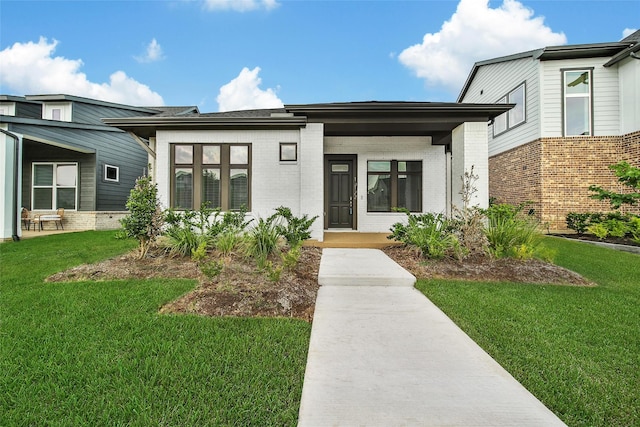 15122 Parkland Canyon Dr, Cypress, TX 77433 - entrance to property with brick siding, a lawn, and a porch