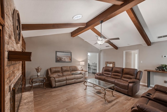 4957 Shadowbend Dr, Corpus Christi, TX 78413 - living area featuring a brick fireplace, a ceiling fan, and light wood-style flooring