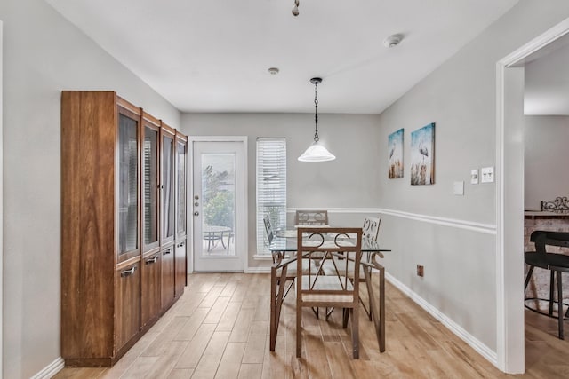 4957 Shadowbend Dr, Corpus Christi, TX 78413 - dining space featuring light wood-style floors and baseboards