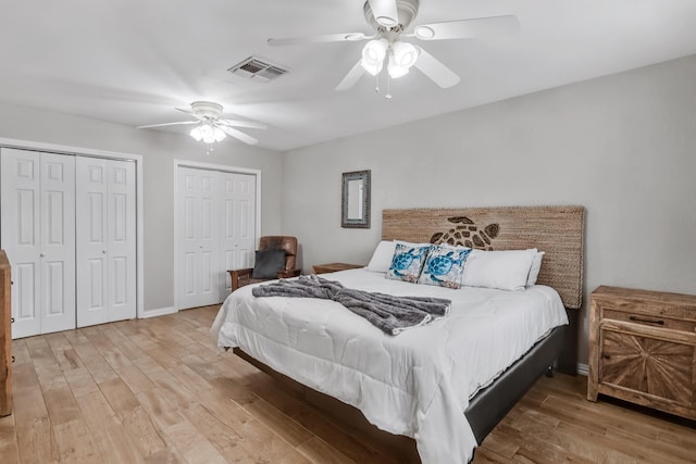 4957 Shadowbend Dr, Corpus Christi, TX 78413 - bedroom featuring light wood-style flooring, two closets, and ceiling fan