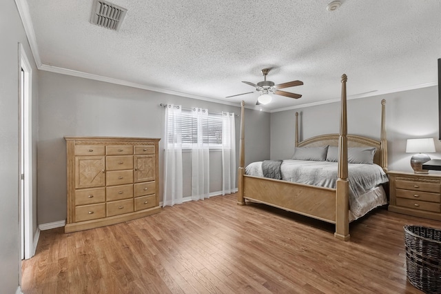 4957 Shadowbend Dr, Corpus Christi, TX 78413 - bedroom featuring wood finished floors, crown molding, a textured ceiling, and ceiling fan