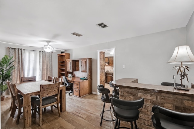 4957 Shadowbend Dr, Corpus Christi, TX 78413 - dining space featuring light wood-style flooring and a ceiling fan
