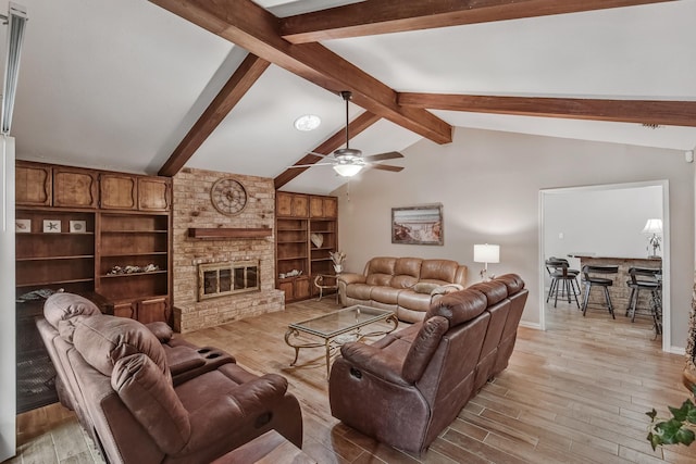4957 Shadowbend Dr, Corpus Christi, TX 78413 - living room with ceiling fan, light wood-type flooring, and a fireplace