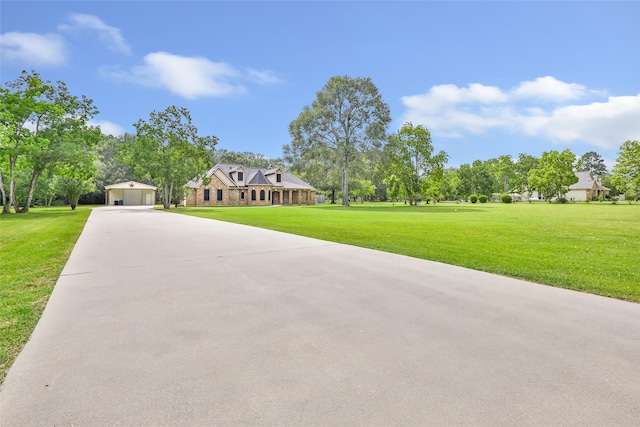 15908 Mcnorton, Splendora, TX 77372 - view of front of property with a front yard and driveway