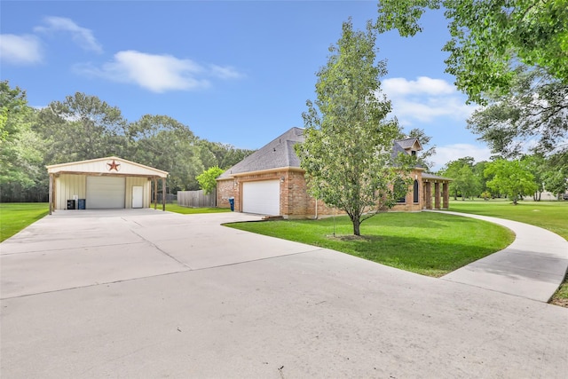 15908 Mcnorton, Splendora, TX 77372 - view of front of property featuring a detached garage and brick siding