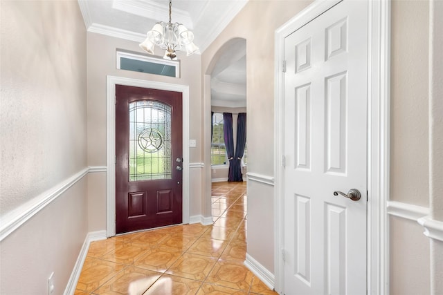 15908 Mcnorton, Splendora, TX 77372 - entryway with arched walkways, crown molding, light tile patterned floors, and a chandelier