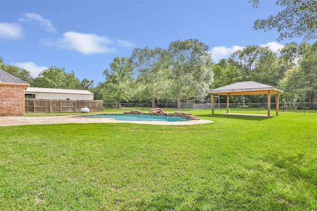 15908 Mcnorton, Splendora, TX 77372 - fenced backyard with a gazebo and view of wooded area