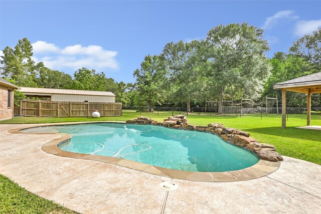 15908 Mcnorton, Splendora, TX 77372 - view of swimming pool with a fenced backyard and a patio area