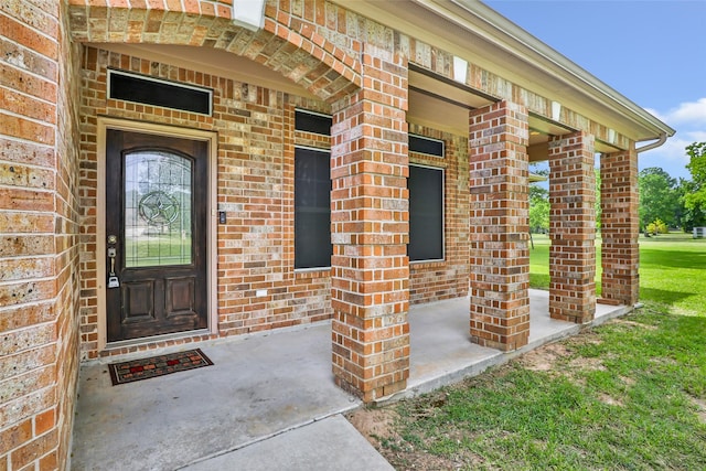 15908 Mcnorton, Splendora, TX 77372 - doorway to property with brick siding