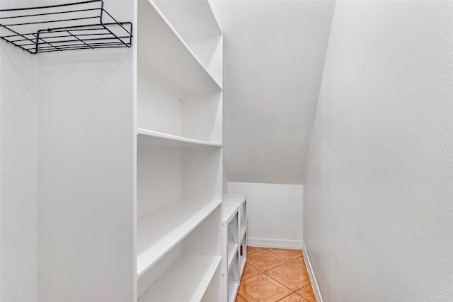 15908 Mcnorton, Splendora, TX 77372 - spacious closet with light tile patterned floors