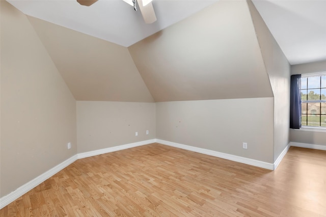 15908 Mcnorton, Splendora, TX 77372 - bonus room featuring a ceiling fan, light wood-style floors, and vaulted ceiling