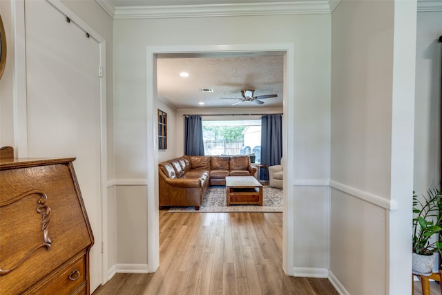 2827 Fontana Dr, Houston, TX 77043 - living area with light wood-style floors, crown molding, and ceiling fan