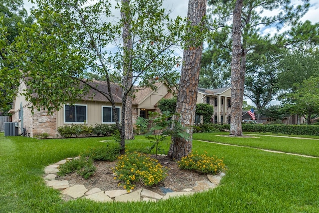 2827 Fontana Dr, Houston, TX 77043 - view of front of house featuring a front yard and brick siding