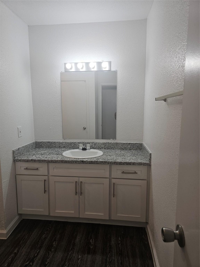 9201 Clarewood Dr Unit 204, Houston, TX 77036 - bathroom featuring vanity and wood finished floors