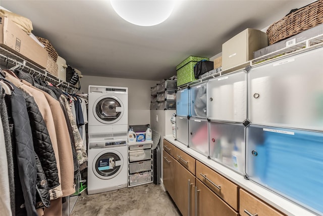 705 Main St Unit 801, Houston, TX 77002 - laundry room with stacked washer / drying machine and cabinet space
