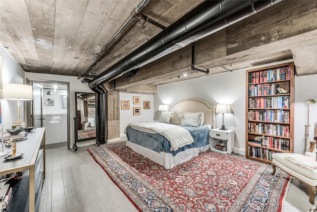 705 Main St Unit 801, Houston, TX 77002 - bedroom with light wood-type flooring