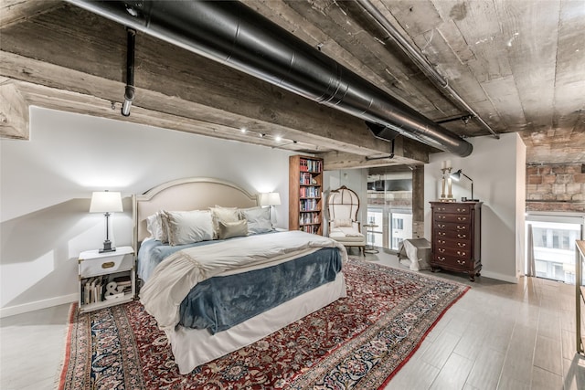 705 Main St Unit 801, Houston, TX 77002 - bedroom featuring wood finished floors
