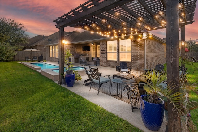 8903 Purdy Crescent Trl, Richmond, TX 77406 - fenced backyard with a pergola, a pool with connected hot tub, a patio area, and an outdoor hangout area