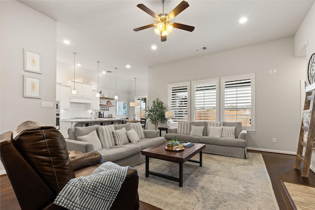 8903 Purdy Crescent Trl, Richmond, TX 77406 - living area featuring a ceiling fan, dark wood-style flooring, and recessed lighting
