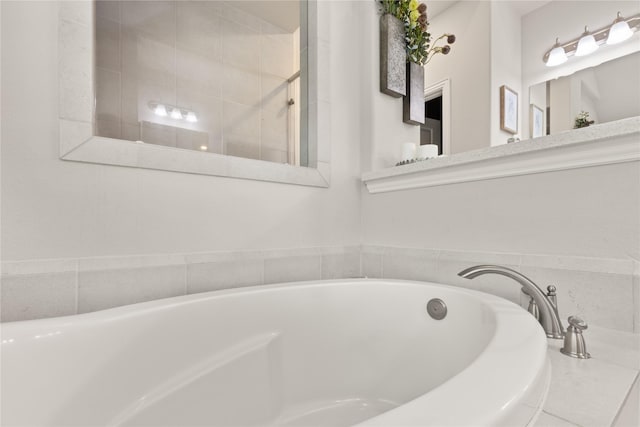 8903 Purdy Crescent Trl, Richmond, TX 77406 - bathroom featuring a garden tub
