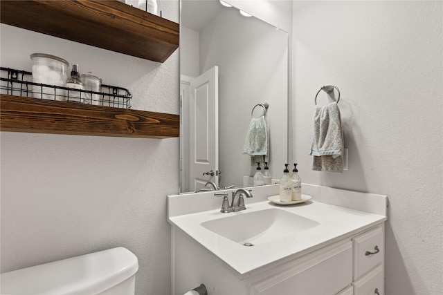 8903 Purdy Crescent Trl, Richmond, TX 77406 - half bathroom featuring vanity and a textured wall