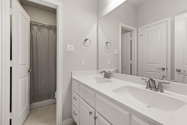 8903 Purdy Crescent Trl, Richmond, TX 77406 - bathroom with double vanity, tile patterned flooring, and a shower with curtain