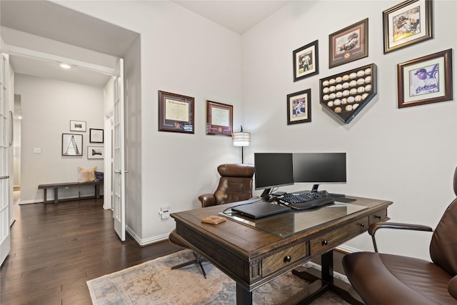 8903 Purdy Crescent Trl, Richmond, TX 77406 - office area featuring dark wood-style flooring and baseboards