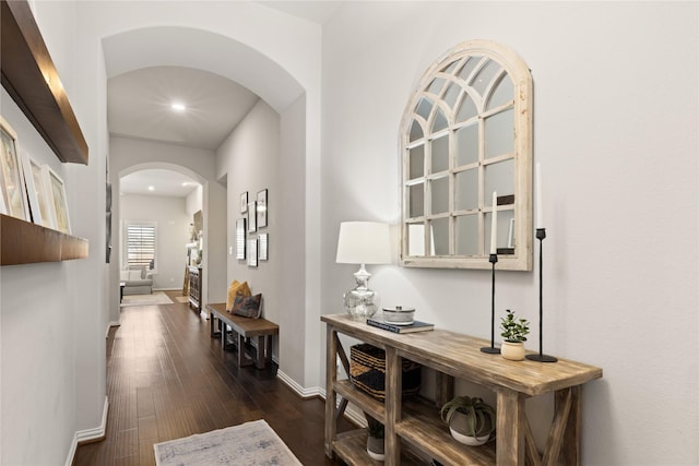 8903 Purdy Crescent Trl, Richmond, TX 77406 - corridor featuring arched walkways, dark wood-style flooring, and recessed lighting