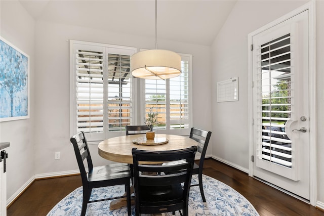 8903 Purdy Crescent Trl, Richmond, TX 77406 - dining space featuring vaulted ceiling and dark wood finished floors