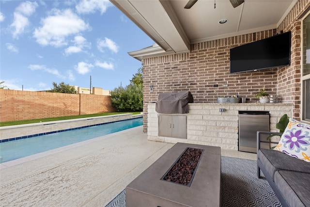 8903 Purdy Crescent Trl, Richmond, TX 77406 - view of patio / terrace with area for grilling, a ceiling fan, and an outdoor fire pit