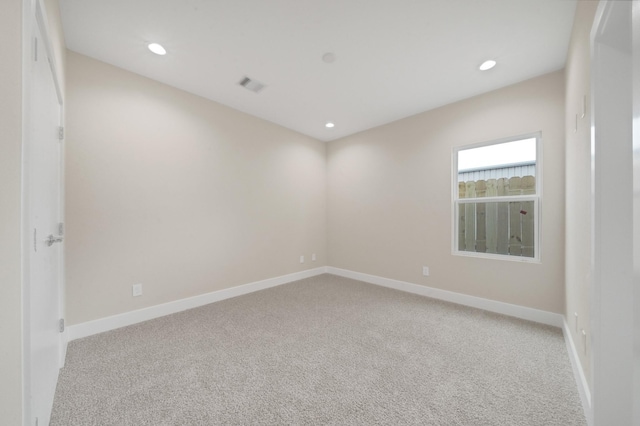 2504 W Tidwell Rd Unit C, Houston, TX 77091 - empty room with light colored carpet and recessed lighting